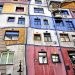 A photo of the Hundertwasserhaus, a building that is a work of art by Hundertwasser