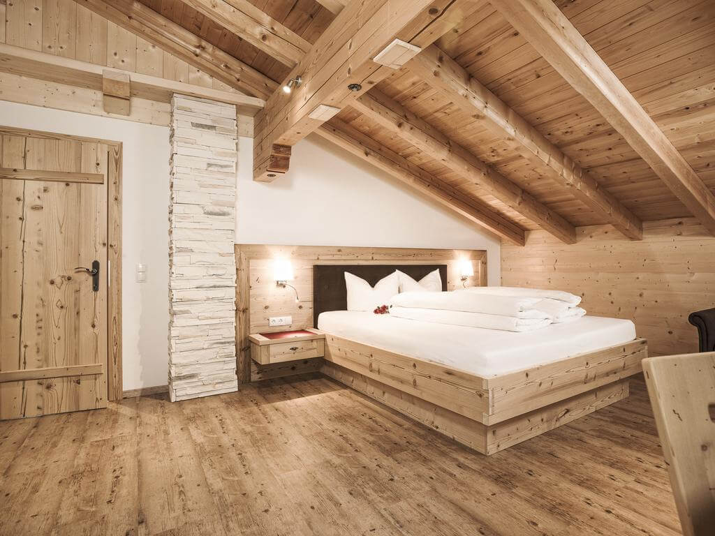 A rustic room at Breierhof Farm. Courtesy of Booking.com