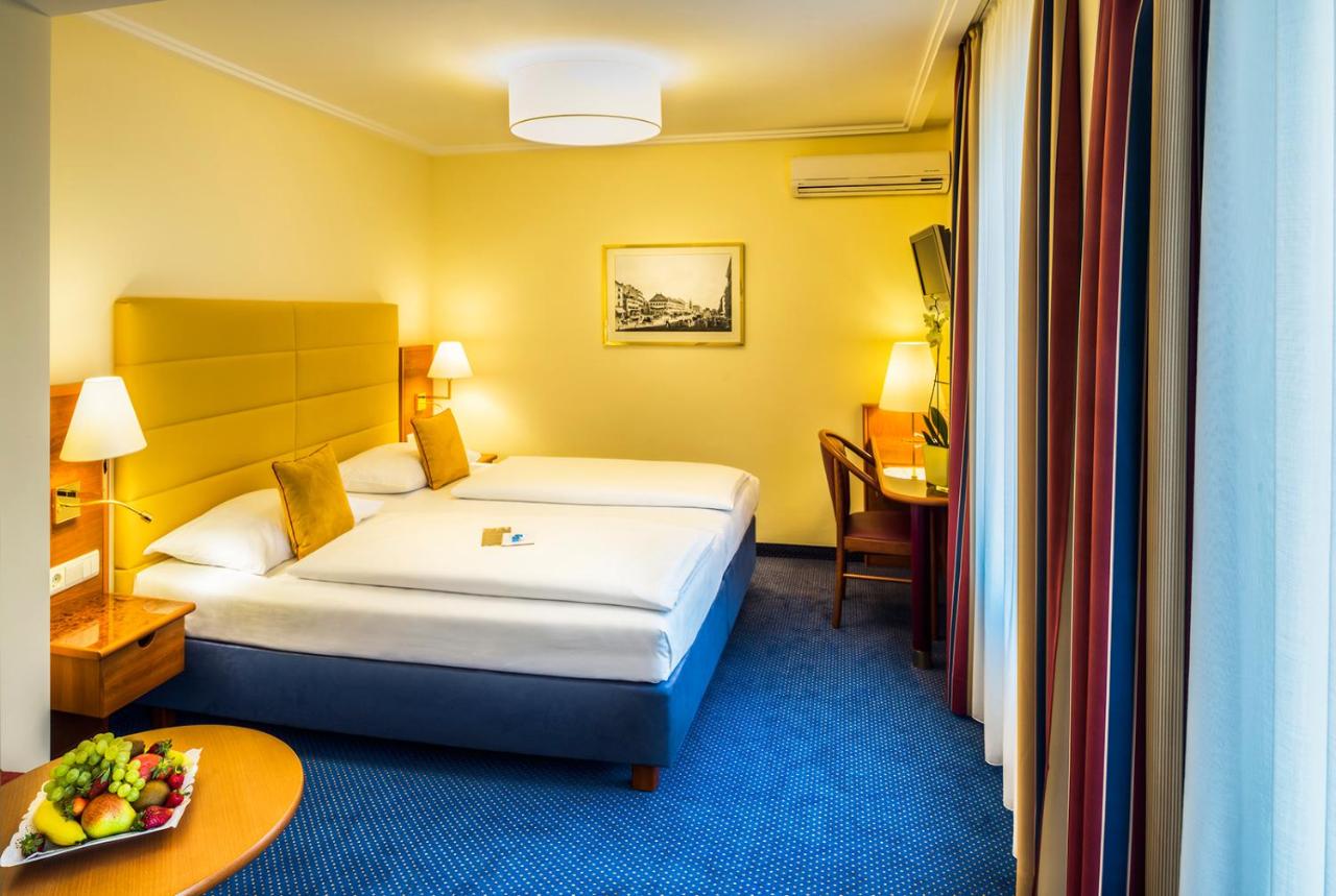 A room at the Austria Classic Hotel. Courtesy of Booking.com.