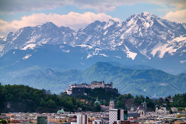 Salzburg city with the castle and snowy mountains